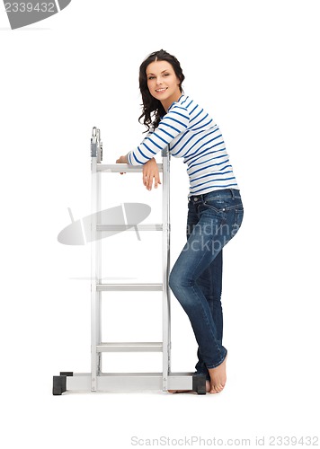 Image of beautiful woman with ladder