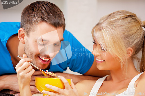 Image of happy couple at home