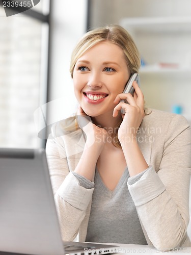 Image of businesswoman with cell phone