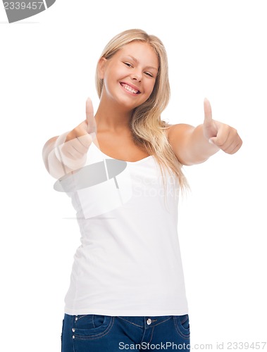 Image of teenage girl in blank white t-shirt with thumbs up