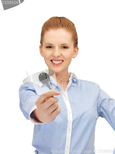 Image of happy woman with car key