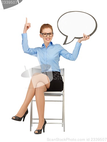 Image of smiling businesswoman with blank text bubble