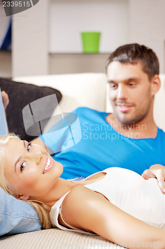 Image of happy couple at home