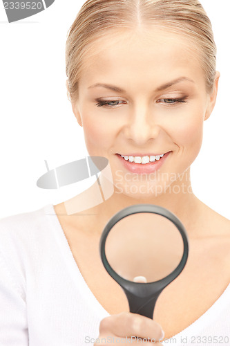 Image of woman with magnifying glass