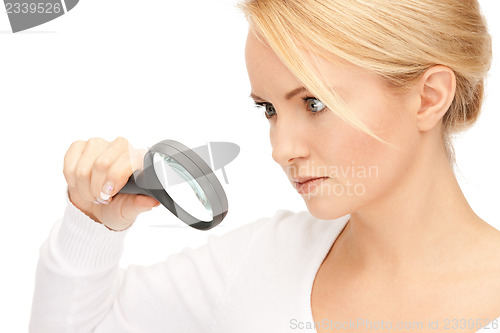 Image of woman with magnifying glass