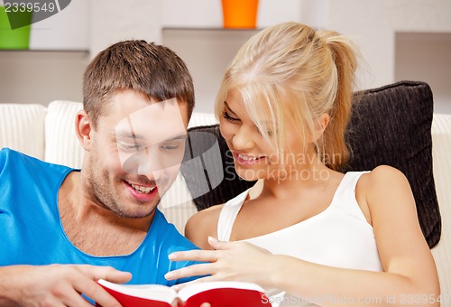 Image of happy couple at home