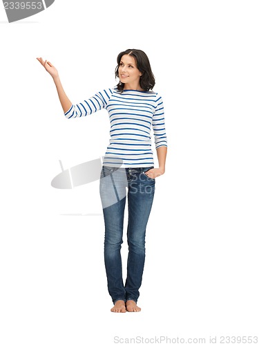 Image of woman in casual clothes showing direction