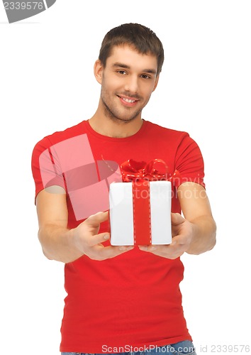 Image of handsome man with a gift