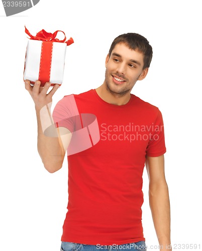 Image of handsome man with a gift