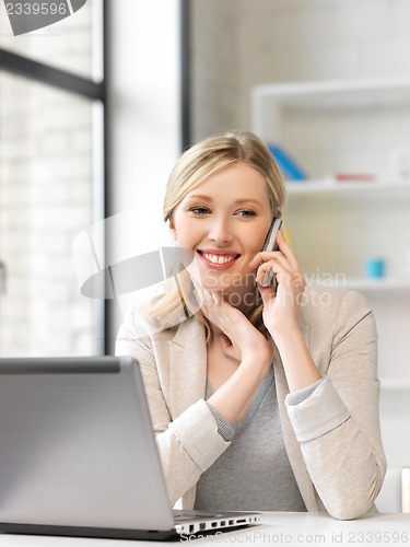Image of businesswoman with cell phone
