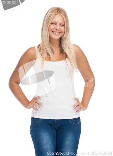 Image of smiling teenage girl in blank white t-shirt