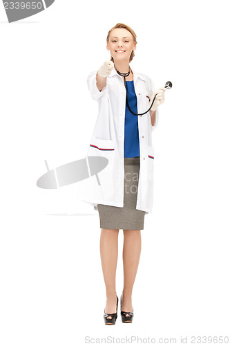 Image of attractive female doctor pointing her finger
