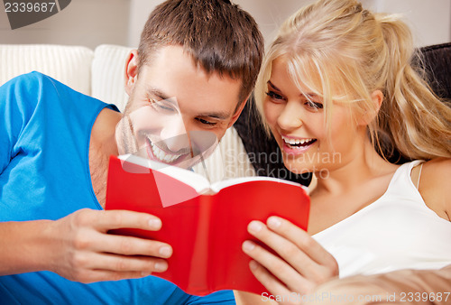 Image of happy couple at home