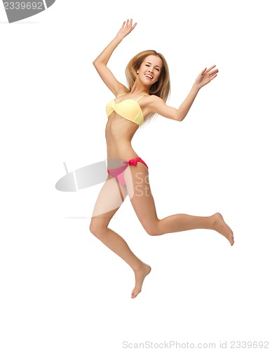 Image of picture of jumping woman in bikini
