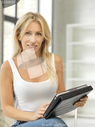 Image of happy woman with tablet pc computer