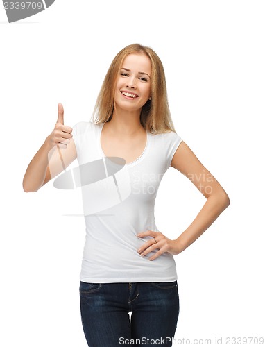 Image of teenage girl in blank white t-shirt with thumbs up