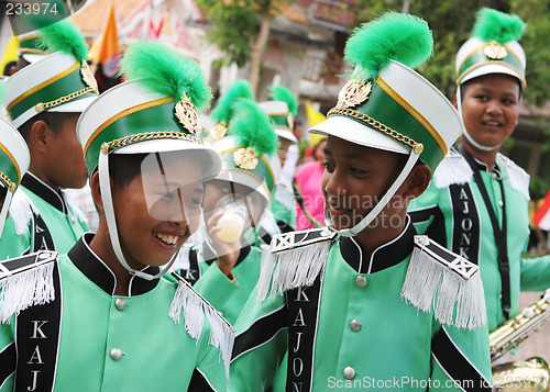 Image of Thai marching band members in traditional dress during in a para