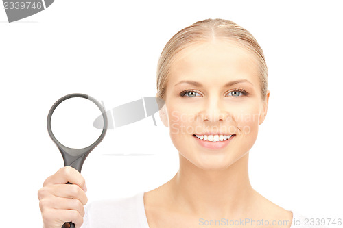 Image of woman with magnifying glass