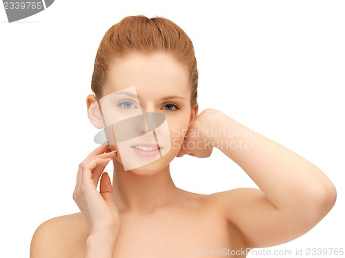 Image of face and hands of teenage girl