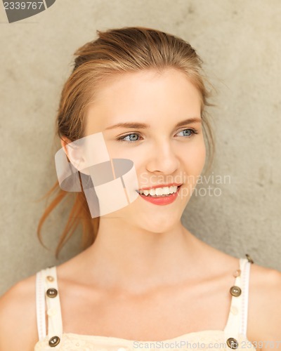 Image of happy and smiling teenage girl