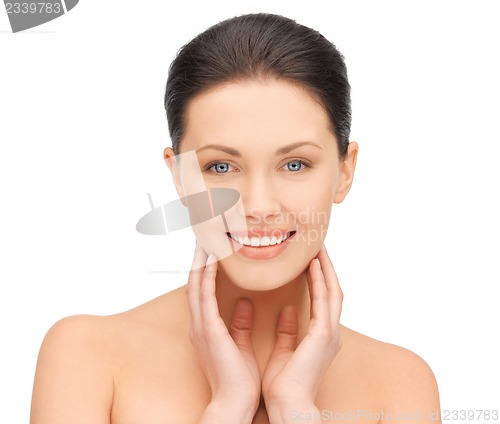 Image of face and hands of beautiful woman