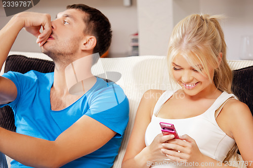 Image of couple with cellphone