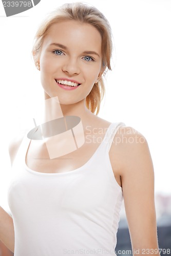 Image of happy and smiling teenage girl