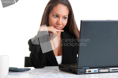 Image of Businesswoman At Office Desk