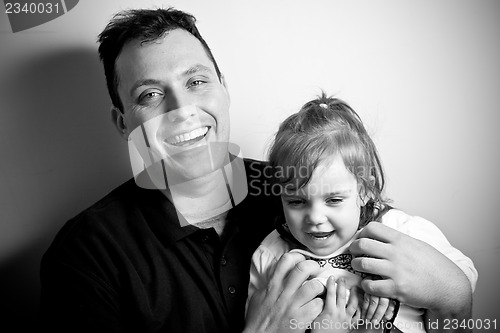 Image of Little Girl with Her Daddy