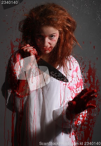 Image of Horror Themed Image With Bleeding Freightened Woman