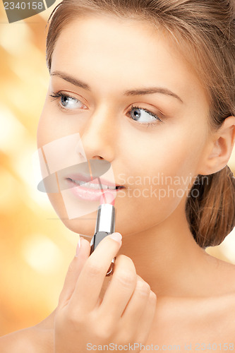 Image of beautiful woman with lipstick