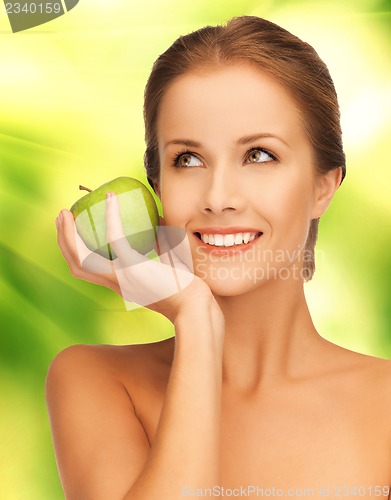 Image of woman with green leaf