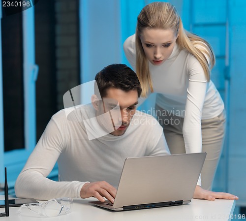Image of man and woman in laboratory