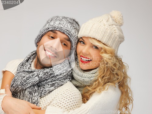 Image of family couple in a winter clothes