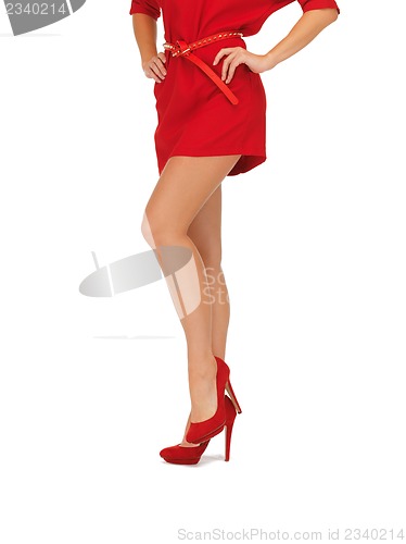Image of picture of woman in red dress on high heels