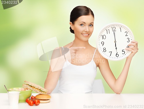 Image of woman with big clock
