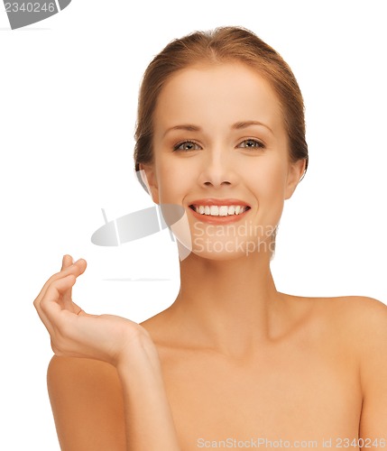 Image of beautiful woman with moisturizing creme drop