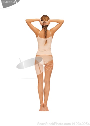 Image of rear view of beautiful woman in cotton undrewear