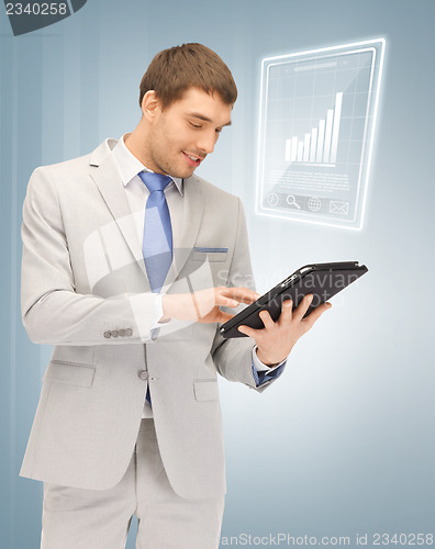 Image of happy man with tablet pc computer