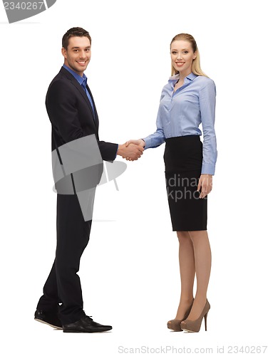 Image of man and woman shaking their hands