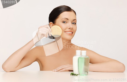 Image of woman with sponge