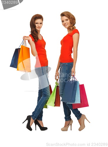 Image of two teenage girls with shopping bags