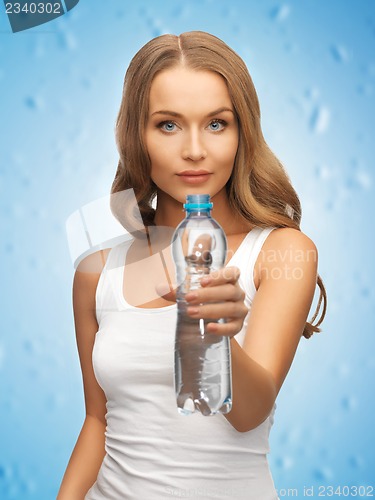 Image of young beautiful woman with  bottle of water