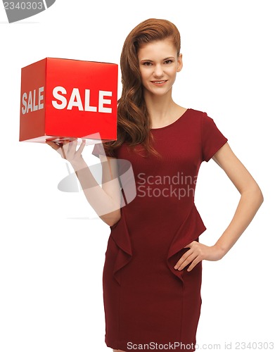 Image of teenage girl in red dress with sale sign