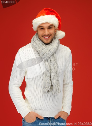 Image of handsome man in christmas hat