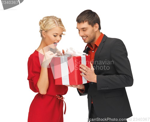 Image of man and woman with present