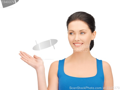 Image of woman holding something on the palm