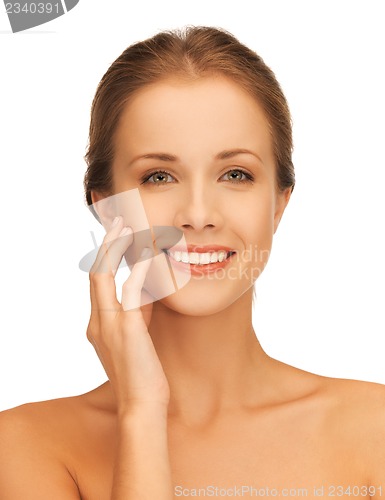 Image of face and hands of beautiful woman