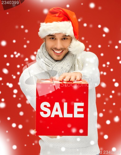 Image of handsome man in christmas hat