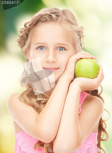 Image of little girl with green apple